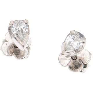 PAIR OF STUD EARRINGS WITH DIAMONDS IN PALLADIUM SILVER, SILVER AND METAL BASE 2 Pear cut diamonds ~0.44 ct Clarity: I1-I2 Color: J-K