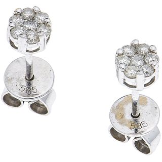 PAIR OF STUD EARRINGS WITH DIAMONDS IN 14K WHITE GOLD Brilliant cut diamonds ~0.28 ct. Weight: 1.2 g