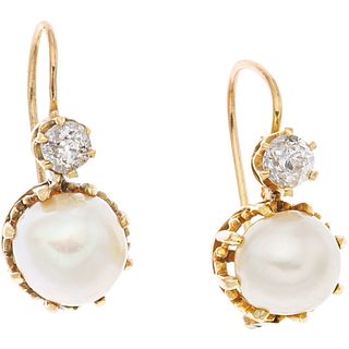 PAIR OF EARRINGS WITH CULTURED PEARLS AND DIAMONDS IN 14K AND 10K YELLOW GOLD Cream colored pearls and antique cut diamonds ~0.30 ct