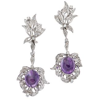 PAIR OF EARRINGS WITH AMETHYSTS AND DIAMONDS IN PALLADIUM SILVER Cabochon cut amethysts ~6.0 ct, brilliant cut diamonds ~0.70 ct