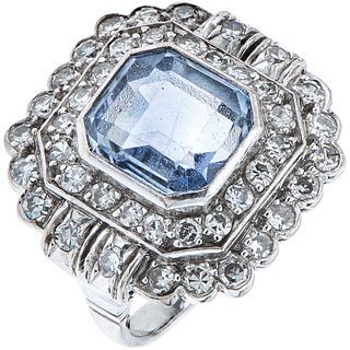 RING WITH SAPPHIRE AND DIAMONDS IN PALLADIUM SILVER Octagonal cut sapphire ~4.0 ct, 8x8 cut diamonds~1.20 ct. Size: 6 ¼