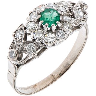 RING WITH EMERALD AND DIAMONDS IN PALLADIUM SILVER 1 Round cut emerald ~0.25 ct, 8x8 cut diamonds ~0.45 ct. Size: 9 ½