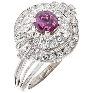 RING WITH RUBY AND DIAMONDS IN PALLADIUM SILVER 1 Oval cut ruby ~0.40 ct, 8x8 cut diamonds~0.44 ct. Size: 8 ½