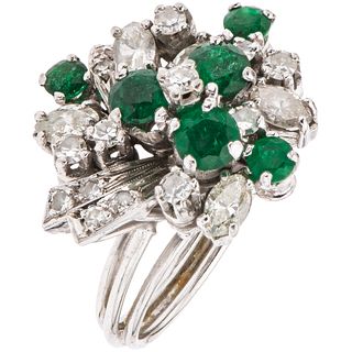 RING WITH EMERALDS AND DIAMONDS IN PALLADIUM SILVER Round cut emeralds ~0.90 ct, 8x8 and marquise cut diamonds. Size: 5 ½