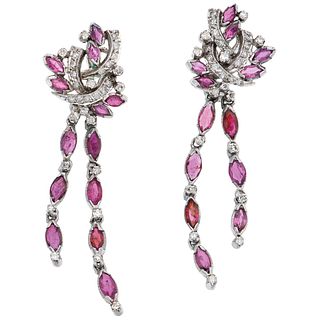PAIR OF EARRINGS WITH RUBIES AND DIAMONDS IN PALLADIUM SILVER Marquise cut rubies ~3.50 ct, 8x8 cut diamonds ~0.50 ct. Weight: 12.6 g