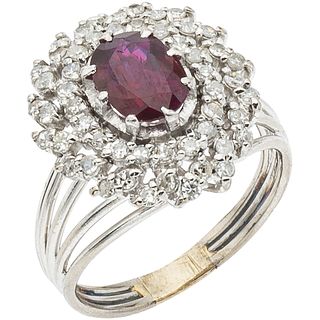 RING WITH RUBY AND DIAMONDS IN 14K WHITE GOLD 1 Oval cut ruby ~1.0 ct, 8x8 cut diamonds ~1.0 ct. Weight: 6.3 g. Size: 8 ½