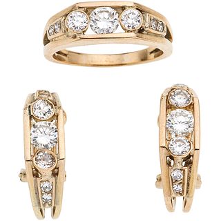 SET OF RING AND PAIR OF EARRINGS WITH DIAMONDS IN 14K YELLOW GOLD 3 Brilliant cut diamonds ~0.95 ct Clarity: VS2-SI1