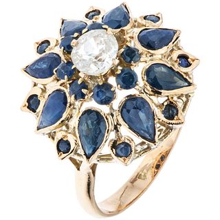 RING WITH DIAMOND AND SAPPHIRES IN 10K YELLOW GOLD 1 Antique cut diamond ~0.40 ct, Round and pear cut sapphires ~2.30 ct