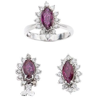 SET OF RING AND PAIR OF EARRINGS WITH RUBIES AND DIAMONDS IN PALLADIUM SILVER Marquise cut rubies ~2.0 ct, brilliant cut diamonds