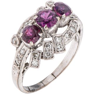 RING WITH RUBELITES AND DIAMONDS IN PALLADIUM SILVER Round cut rubelites ~0.80 ct, 8x8 cut diamonds ~0.25 ct. Size: 8