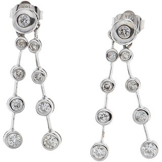 PAIR OF EARRINGS WITH DIAMONDS IN 14K WHITE GOLD Brilliant cut diamonds ~0.60 ct. Weight: 2.7 g