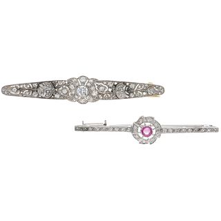 TWO BROOCHES WITH RUBY AND DIAMONDS IN PLATINUM, 18K YELLOW GOLD AND PALLADIUM SILVER Weight: 13.4 g