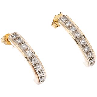 PAIR OF EARRINGS WITH DIAMONDS IN 10K YELLOW GOLD Brilliant cut diamonds ~0.18 ct. Weight: 3.8 g