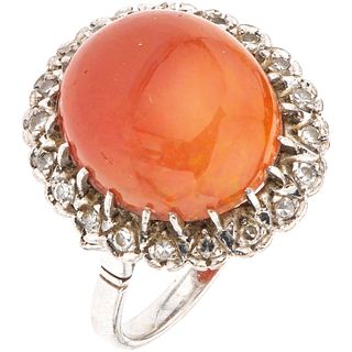 RING WITH OPAL AND DIAMONDS IN PALLADIUM SILVER Fire opal ~7.0 ct, 8x8 cut diamonds ~0.20 ct. Size: 6 ¾