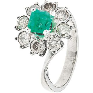 RING WITH EMERALD AND DIAMONDS IN PALLADIUM SILVER Octagonal cut emeralds ~0.80 ct, Brilliant cut diamonds. Size: 7