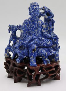 Carved Sodalite Figural Grouping of a Warrior.