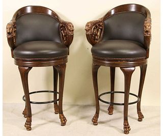 PAIR OF CARVED & GILDED LEATHER BARSTOOLS