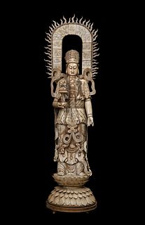 Guanyin. China, 19th century. Ivory. Provenance: Imported directly by the current owner from Beijing, during the 1980s.