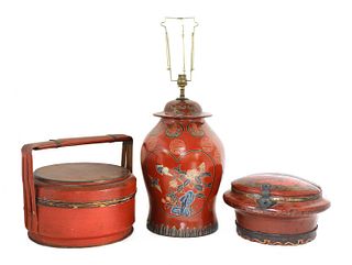 A Chinese red-lacquered food carrier,