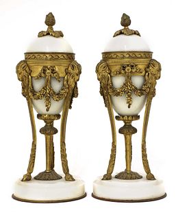 A pair of French Empire-style white marble and ormolu cassolettes,