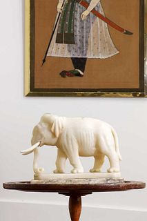 An Indian carved alabaster figure of an elephant,