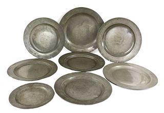 Eight pewter plates,