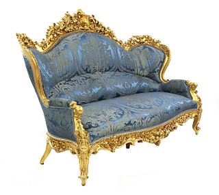 A Continental carved giltwood canapé,