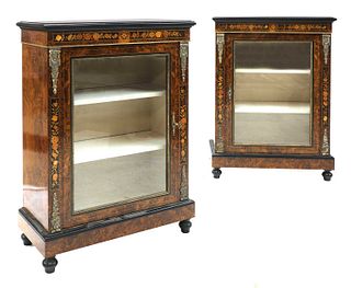 A pair of Victorian figured walnut pier cabinets,