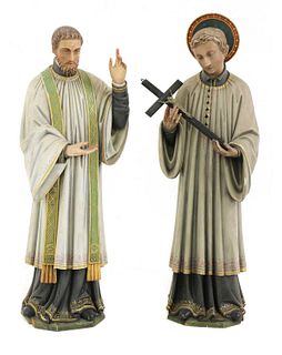 A pair of carved wood figures of saints,