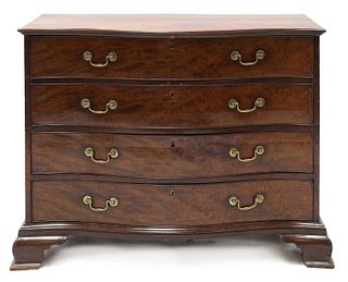 A George III mahogany serpentine front commode,