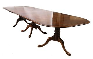 A mahogany triple pedestal dining table,