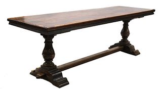 A Continental walnut refectory table,
