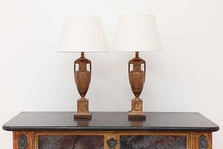 A pair of gilt-spelter urn form table lamps,