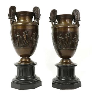 A pair of neoclassical bronze urns,