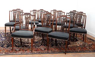 A composed set of sixteen Gustavian mahogany dining chairs,