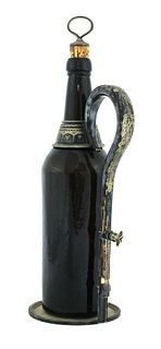 A silver-plated adjustable bottle holder,