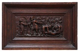 A pair of relief carved oak panels,