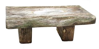 A rustic tree slice coffee table,