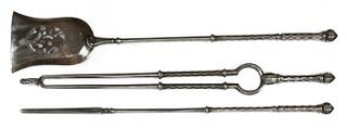 A set of three George III steel fire tools,