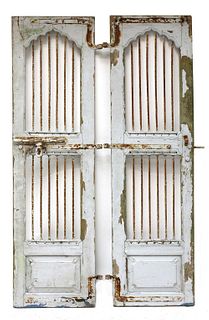 A pair of Indian painted teak and wrought iron doors,