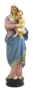 A cast iron figure of Mary and the Infant Christ,