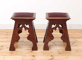 A pair of Liberty-style Arts and Crafts oak stools,