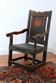 An oak panel back chair,