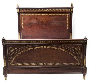 A Louis XVI-style plum pudding mahogany double bed,