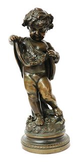 A bronze figure of a bacchanalian putto,