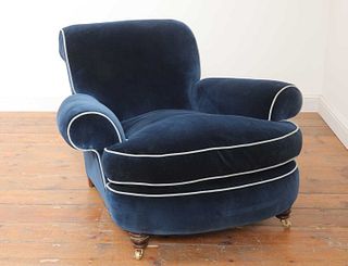 A deep-seated Howard-style armchair,