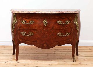 A French Louis XV mahogany, tulipwood and marquetry inlaid commode,