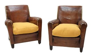 A pair of French leather club chairs,