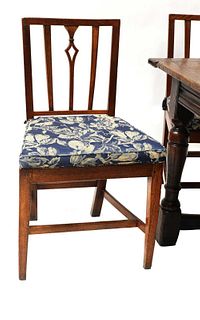 A set of six George III oak and elm 'Country Sheraton' chairs,