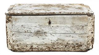 A rustic white-painted trunk,